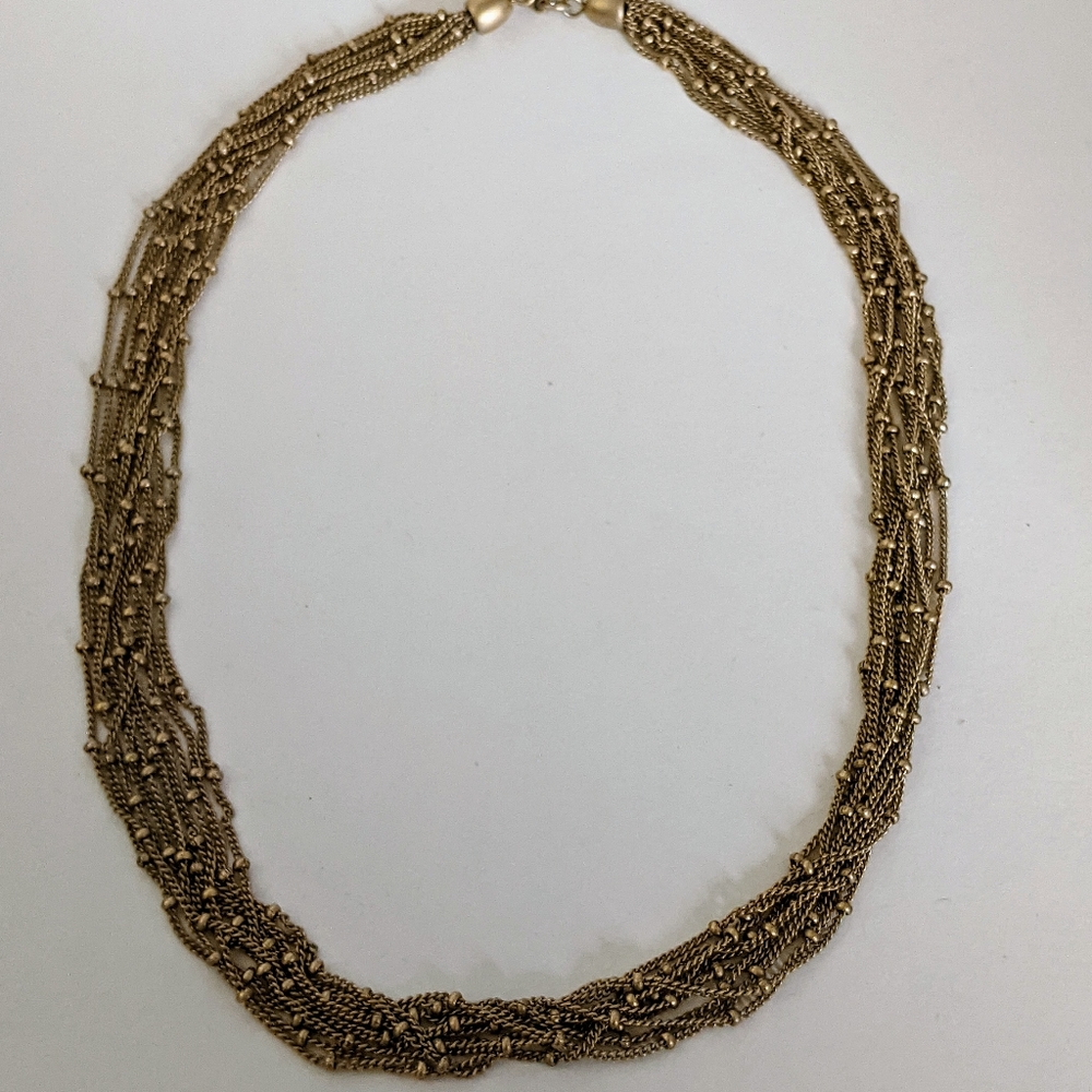 Kenneth Cole antique gold necklace, 15-17 inch.